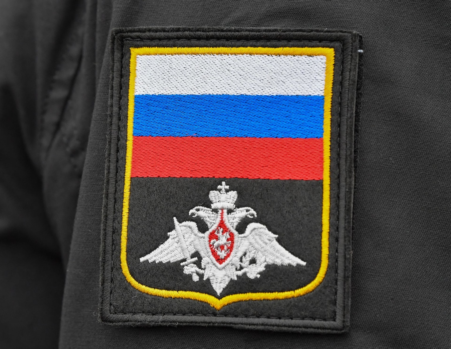 The flag of Russia on the uniform of a soldier pictured on Jan. 31, 2020 (Patrick Pleul/picture alliance via Getty Images)