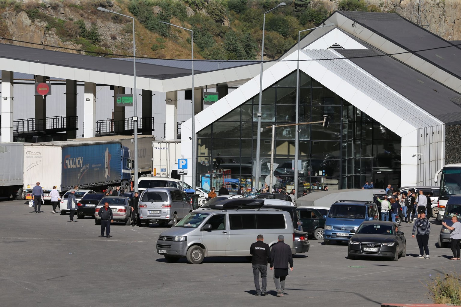 Russians are seen attempting to leave their country to avoid a military call-up for the Russia-Ukraine war as queues have formed at the Kazbegi border crossing in the Kazbegi municipality of Stepantsminda, Georgia, on Sept. 29, 2022. (Davit Kachkachishvili/Anadolu Agency via Getty Images)