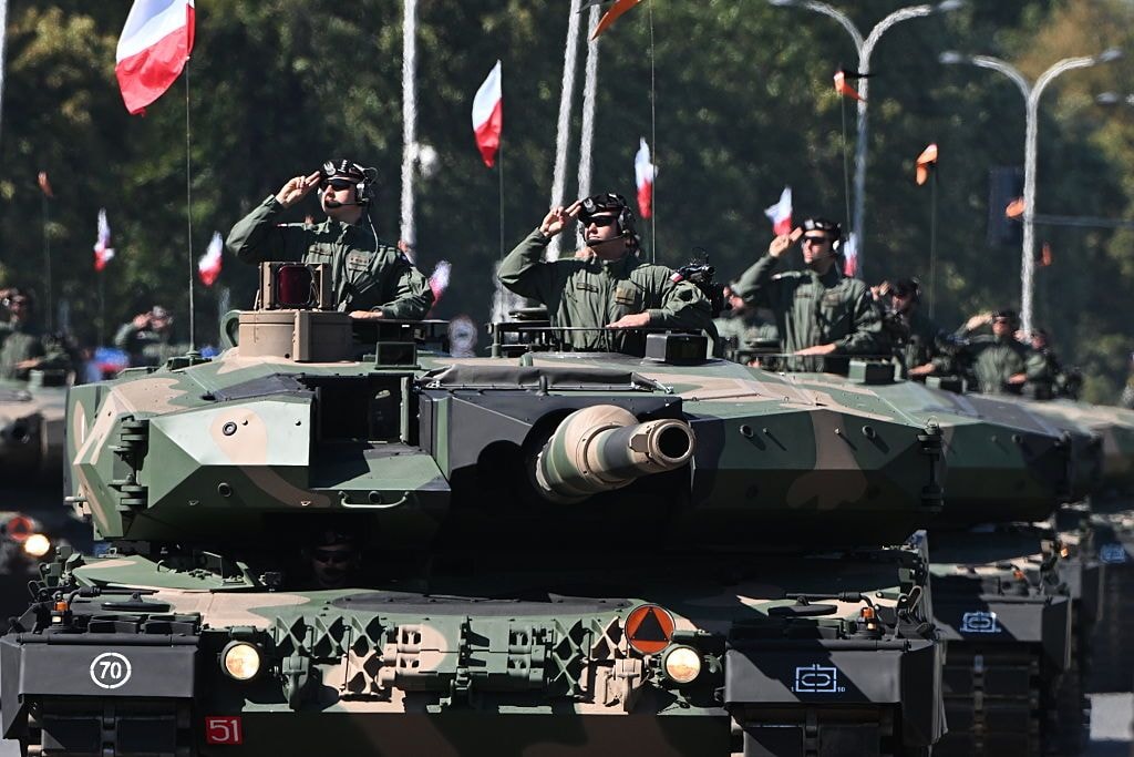 The Polish Army's main battle tanks drive in formation during the Armed Forces Day military parade in Warsaw, Poland, on Aug. 15, 2026. (Artur Widak/NurPhoto via Getty Images)