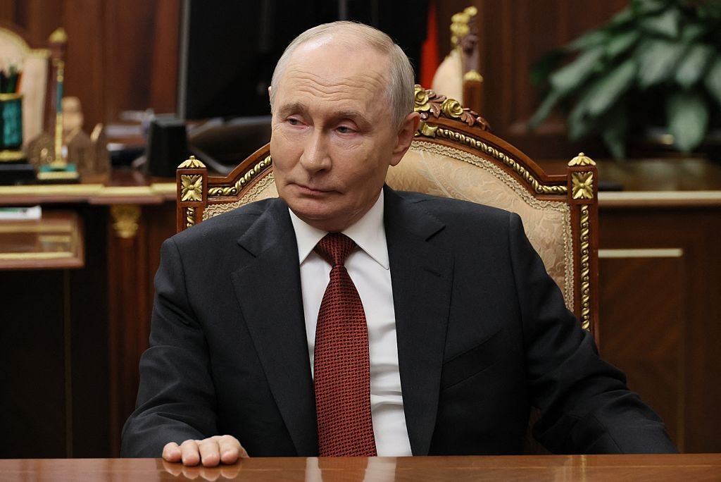 In this pool photograph distributed by the Russian state agency Sputnik, Russian President Vladimir Putin gives an interview to Vesti TV channel in Moscow on Aug. 22, 2026. (Mikhail Metzel / Pool / AFP via Getty Images)