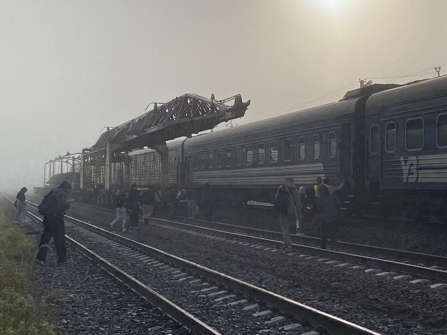 Passengers board their train after being evacuated due to an air raid alert near the border with Poland in Ukraine on Sept. 18, 2026. (Ania Tsoukanova / AFP via Getty Images)