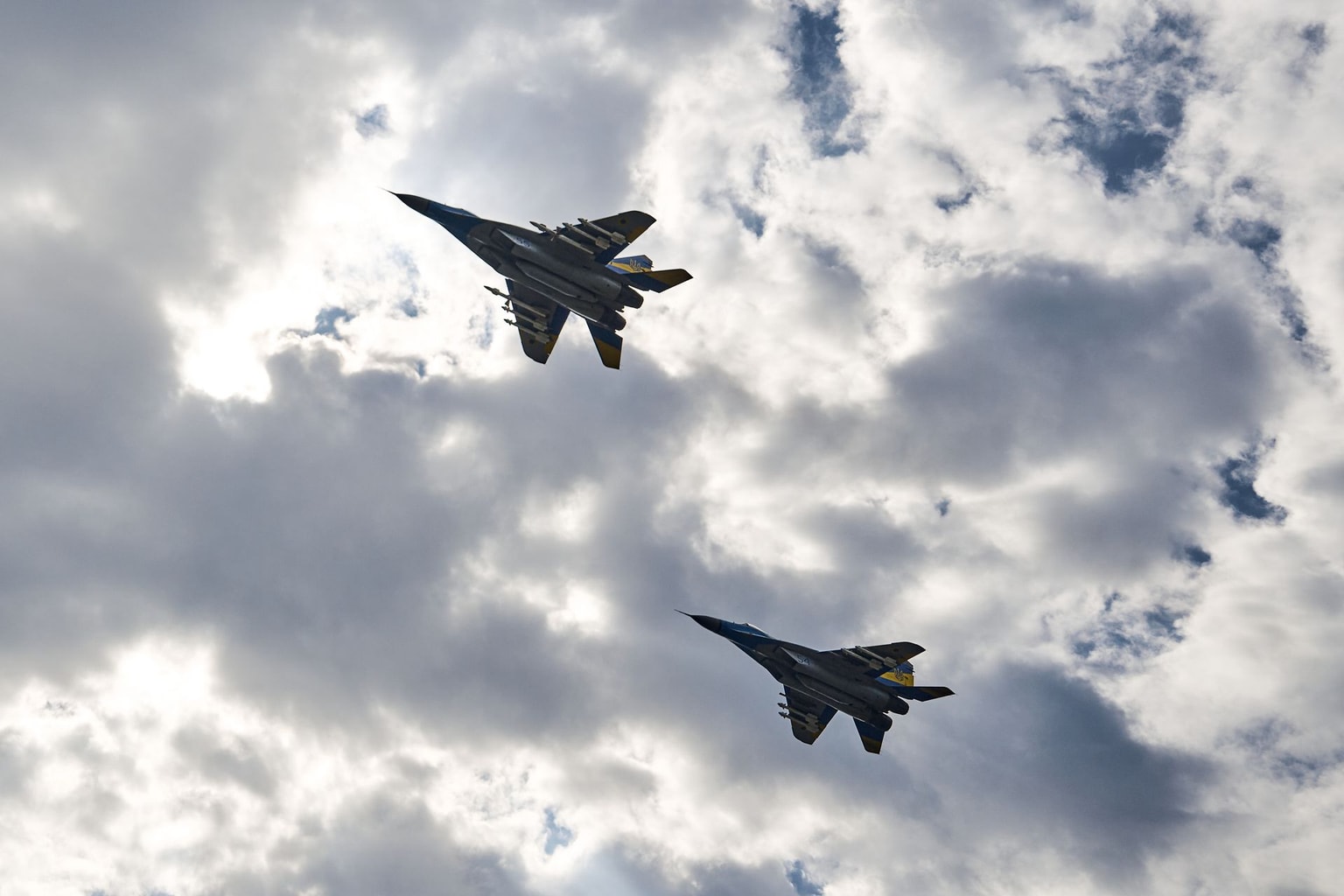 Two MIG-29 planes fly over Shepetivka, in Khmelnytskyi Oblast, Ukraine on August 29, 2024 (Libkos/Getty Images)