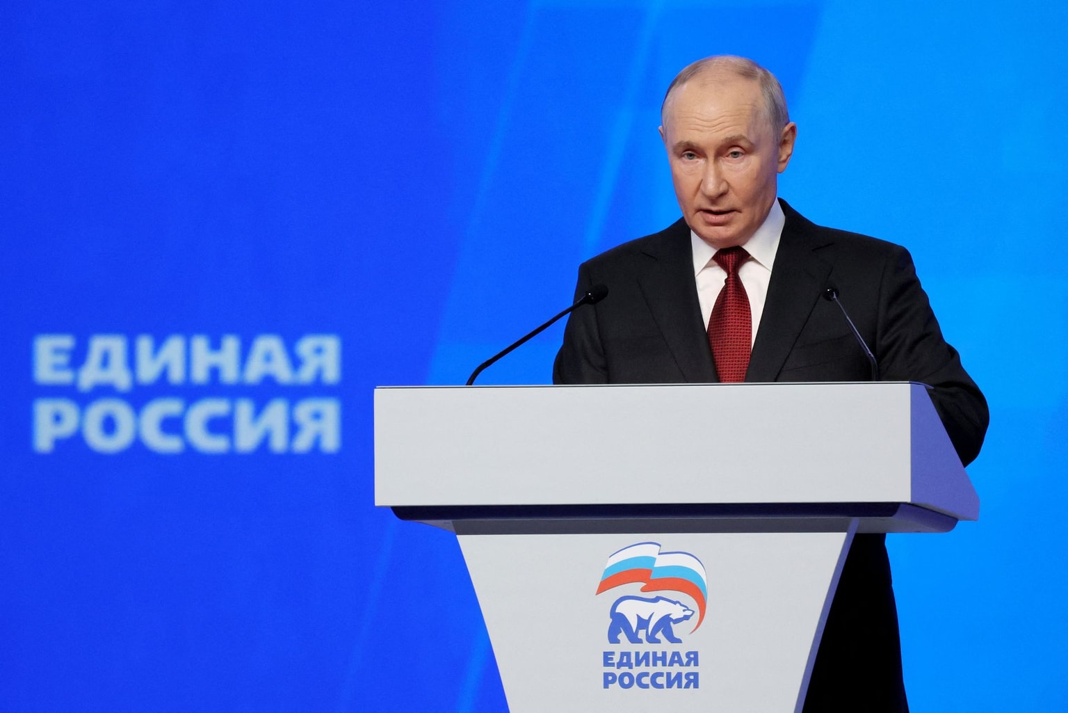 In this pool photograph distributed by the Russian state agency Sputnik, Russian President Vladimir Putin speaks at the second stage of the 23rd Congress of the United Russia party at the Megasport Arena in Moscow on August 22, 2026. (Photo by Yekaterina SHTUKINA / POOL / AFP via Getty Images)