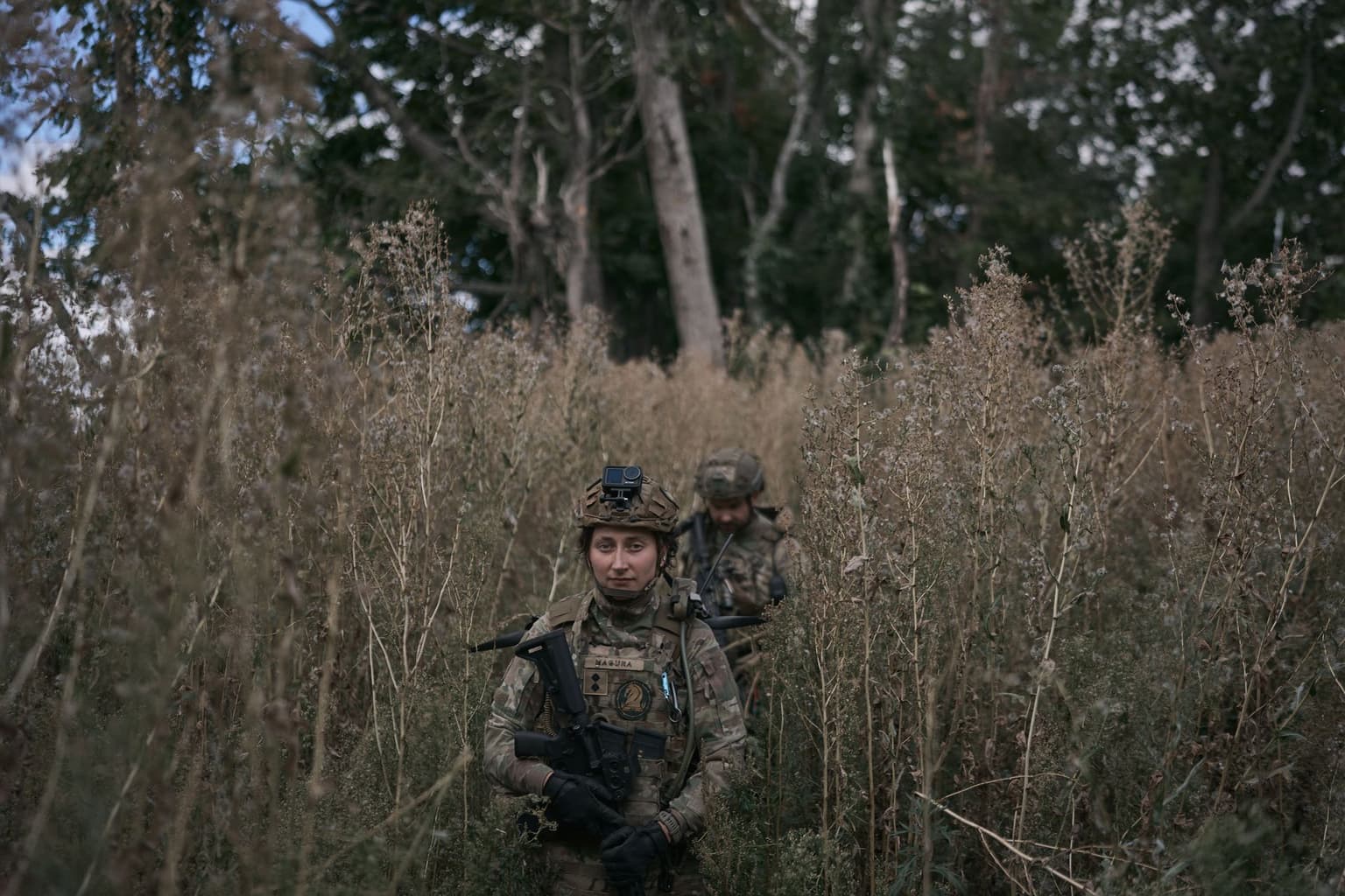Ukrainian soldiers return to their command post in Sumy Oblast, Ukraine, on Aug. 28, 2026.