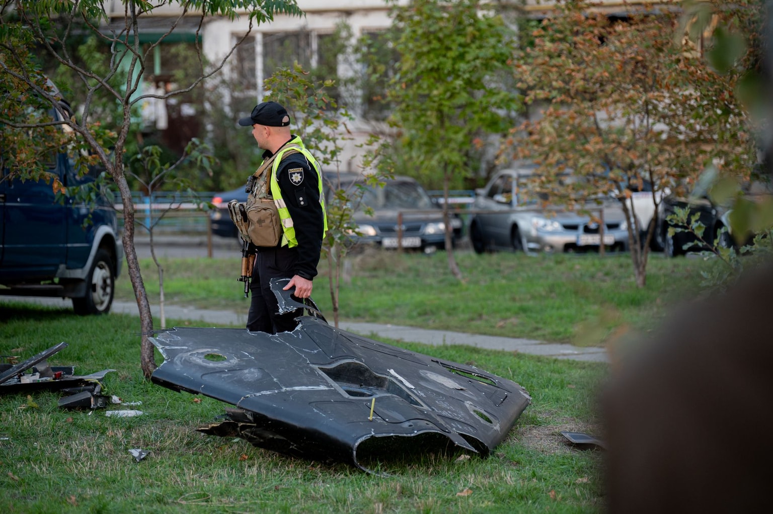 Police officers and explosive ordnance disposal specialists remove wreckage from a Russian drone that falls into the courtyard of an apartment building on Sept. 30, 2026 in Kyiv, Ukraine. (Zinchenko/Global Images Ukraine via Getty Images)