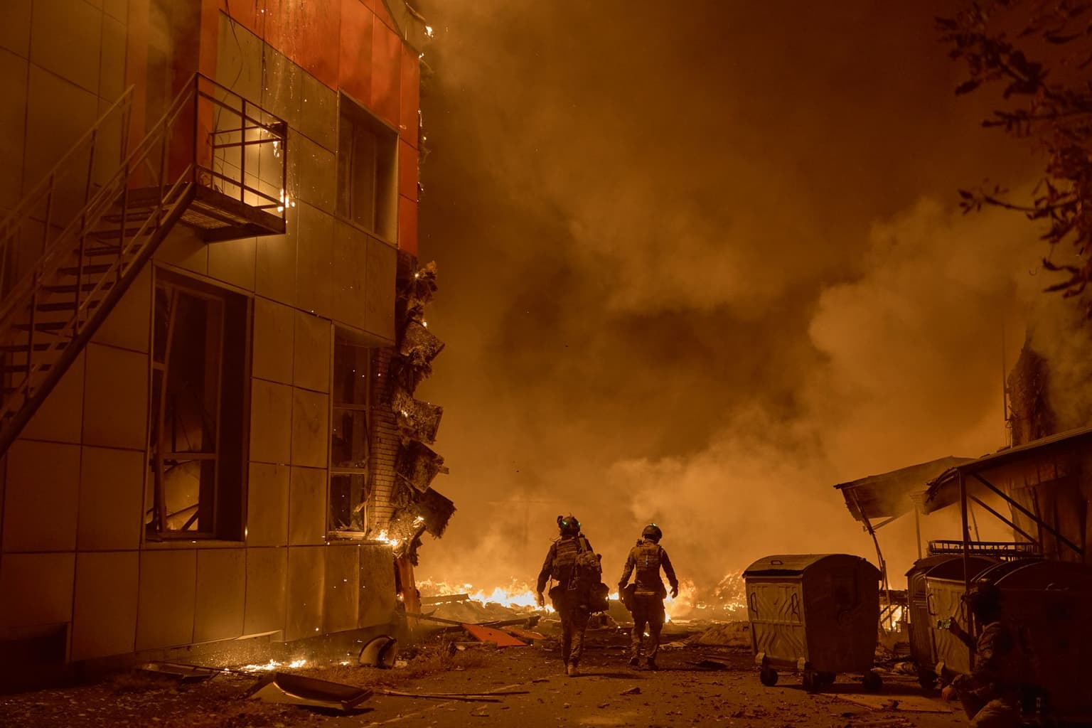 Emergency services deal with the aftermath of a massive Russian missile and drone attack in Kyiv, Ukraine, on Sept. 8, 2026.