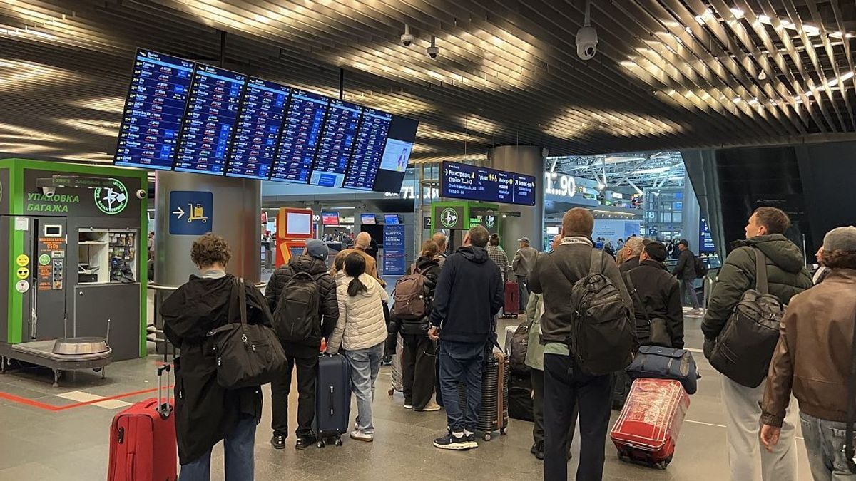 Passengers wait in Vnukova International Airport following flight disruptions caused by Ukrainian drone attacks, in Moscow, Russia, on Oct. 14, 2026. (Stringer/Anadolu via Getty Images)
